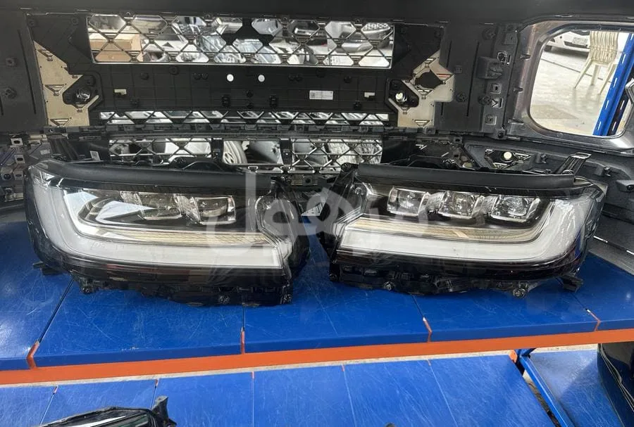 Genuine dealer Jeep VXR right and left headlights.